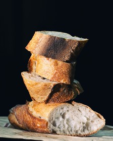 A stack of sliced bread Photo by Rodolfo Marques on Unsplash